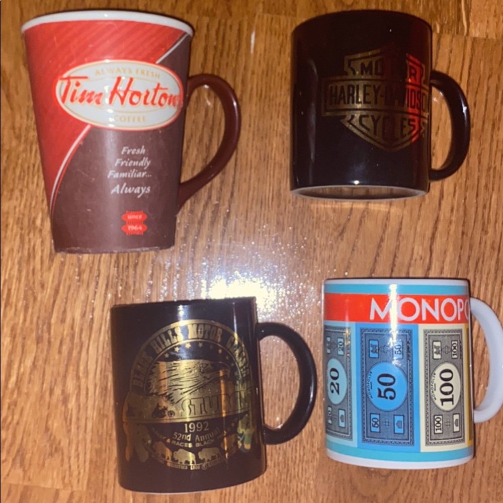 Vintage mugs from Harley Davidson Monopoly and Tim Hortons. All collecters items